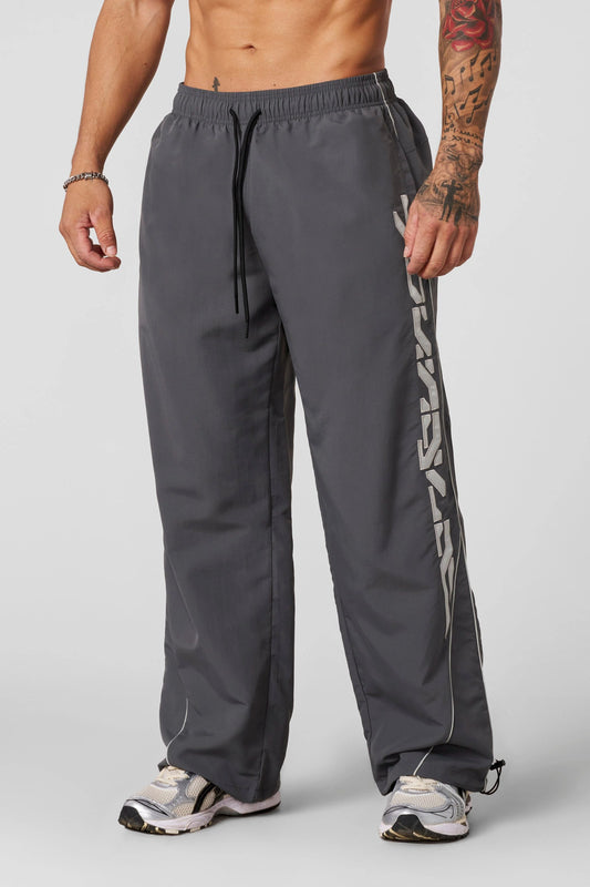 2113 - FOUNDATION TRACK PANTS - GRIS OSCURO