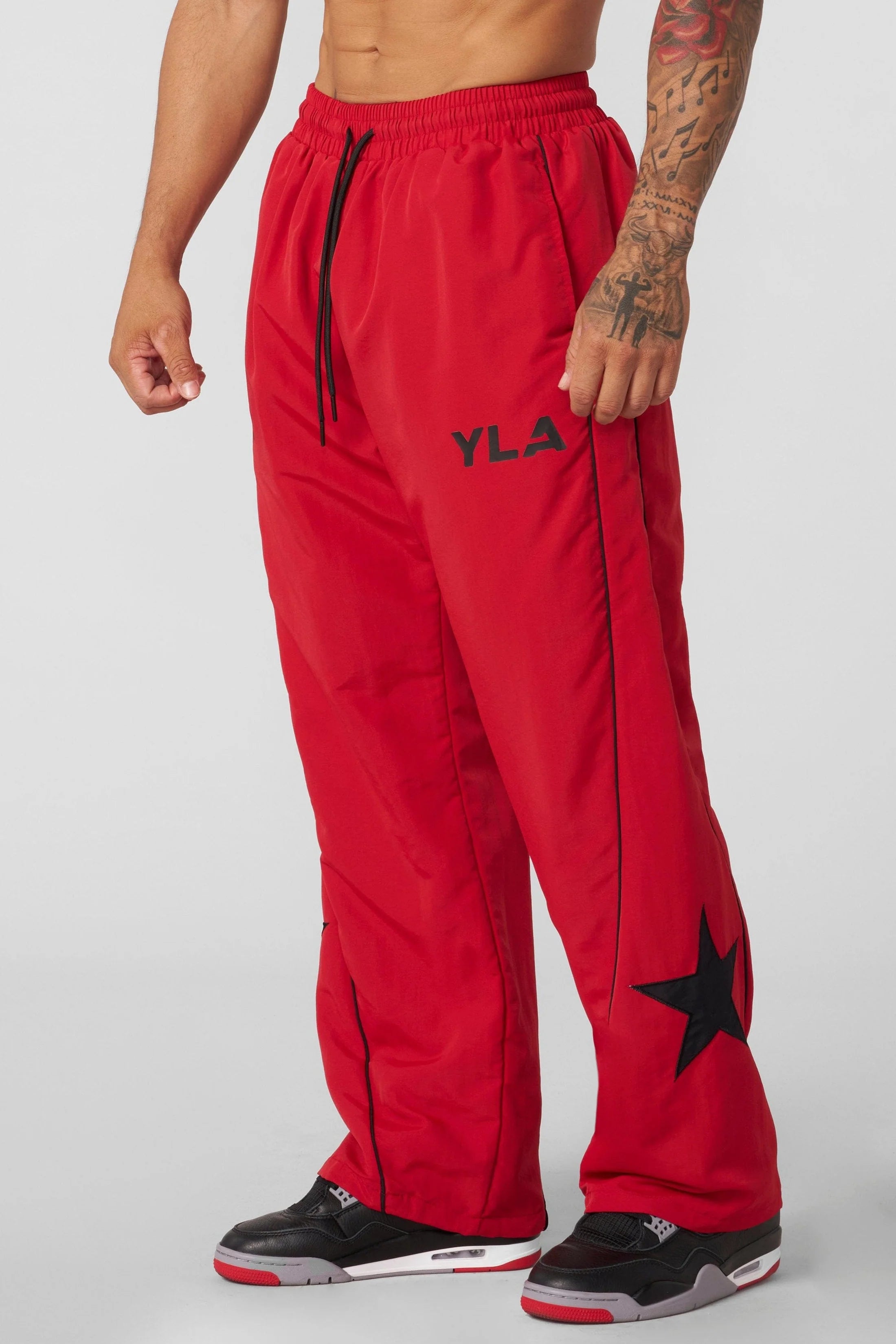 2135 - UFC™ TRACKSUIT PANTS - ROJO