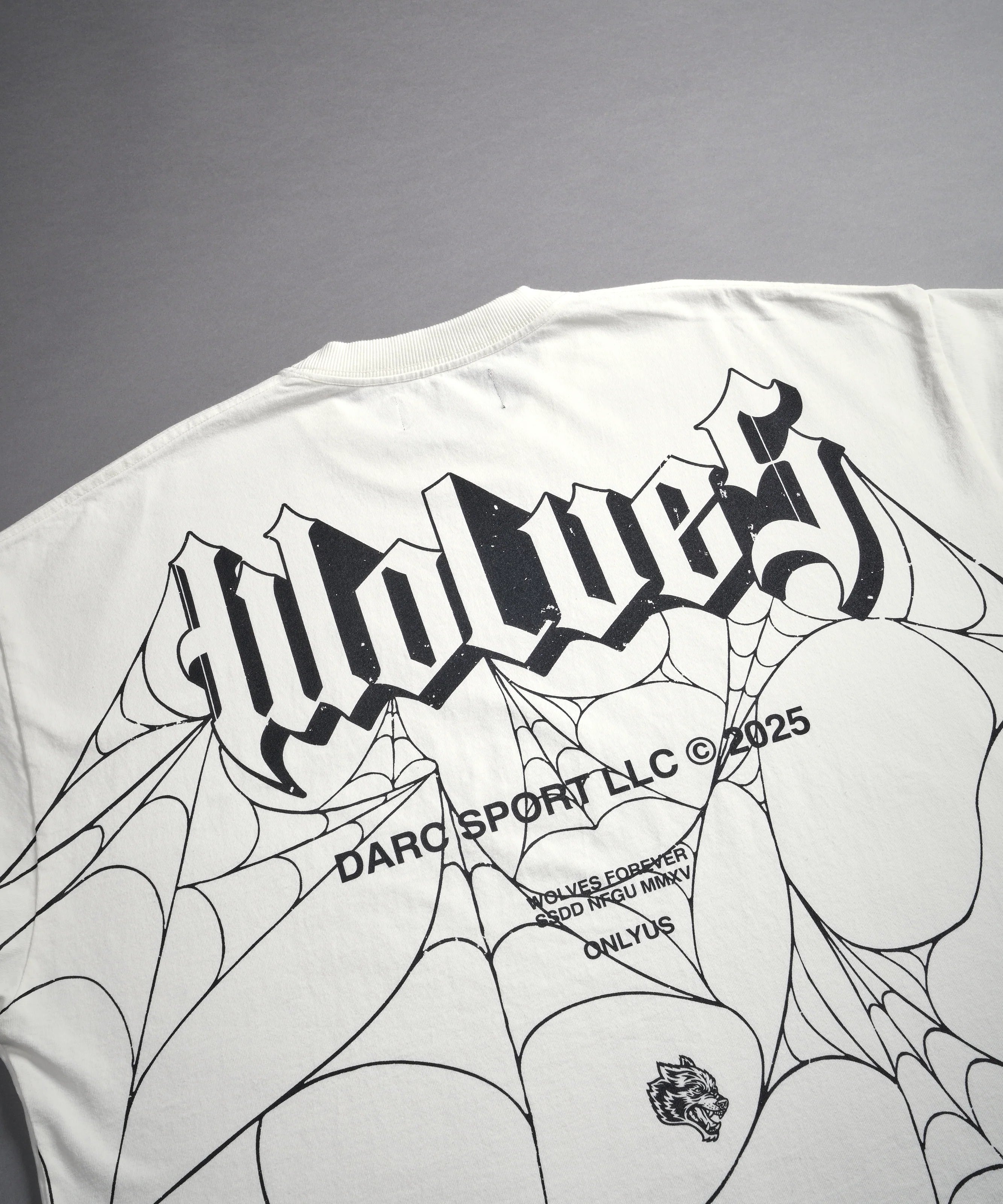 DARCSPORT - WOLVES WEB "GRUNGE" CUT OFF TEE IN CREAM